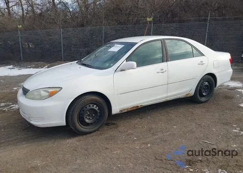 2002 Toyota Camry Xle z USA, uszkodzony, nr VIN 4T1BE32K92U030454